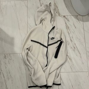 Cream and black men’s Nike tech Size S\M.